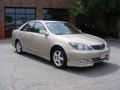 2004 Desert Sand Mica Toyota Camry SE V6  photo #1