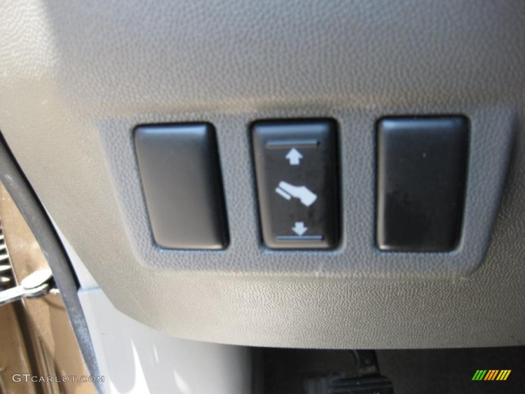 2004 Titan SE Crew Cab - Copper / Sand/Steel photo #19