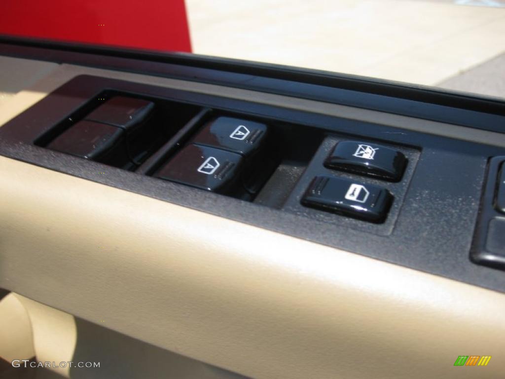 2004 Titan SE Crew Cab - Copper / Sand/Steel photo #20