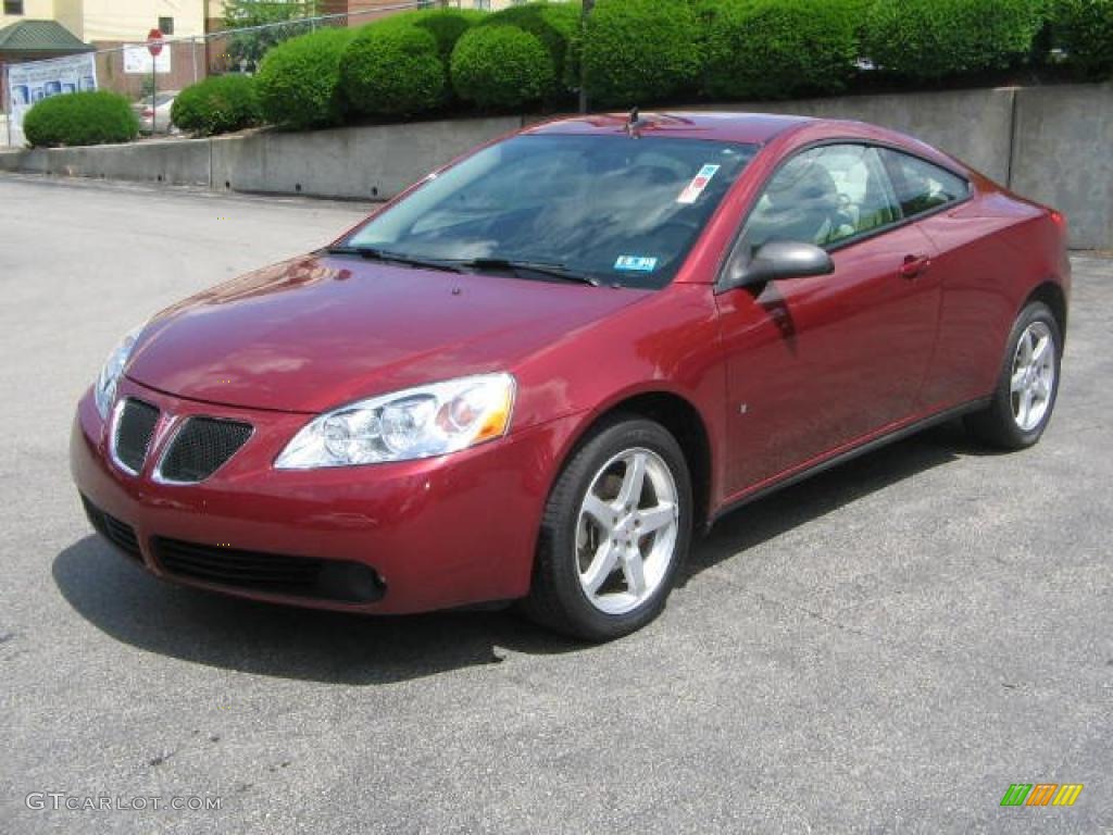 2009 G6 GT Coupe - Performance Red Metallic / Light Taupe photo #2