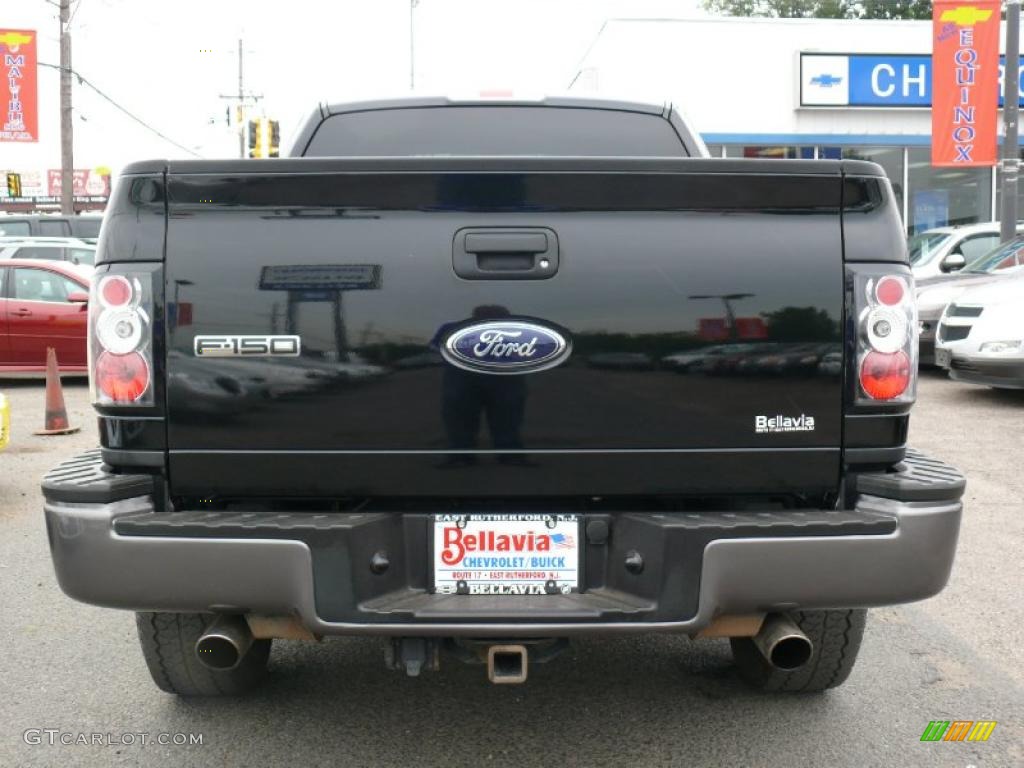 2006 F150 XLT Regular Cab 4x4 - Black / Black photo #5