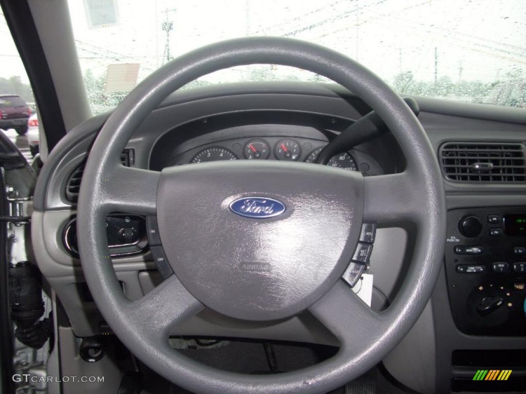 2004 Ford Taurus SE Wagon Medium Graphite Steering Wheel Photo #31297911