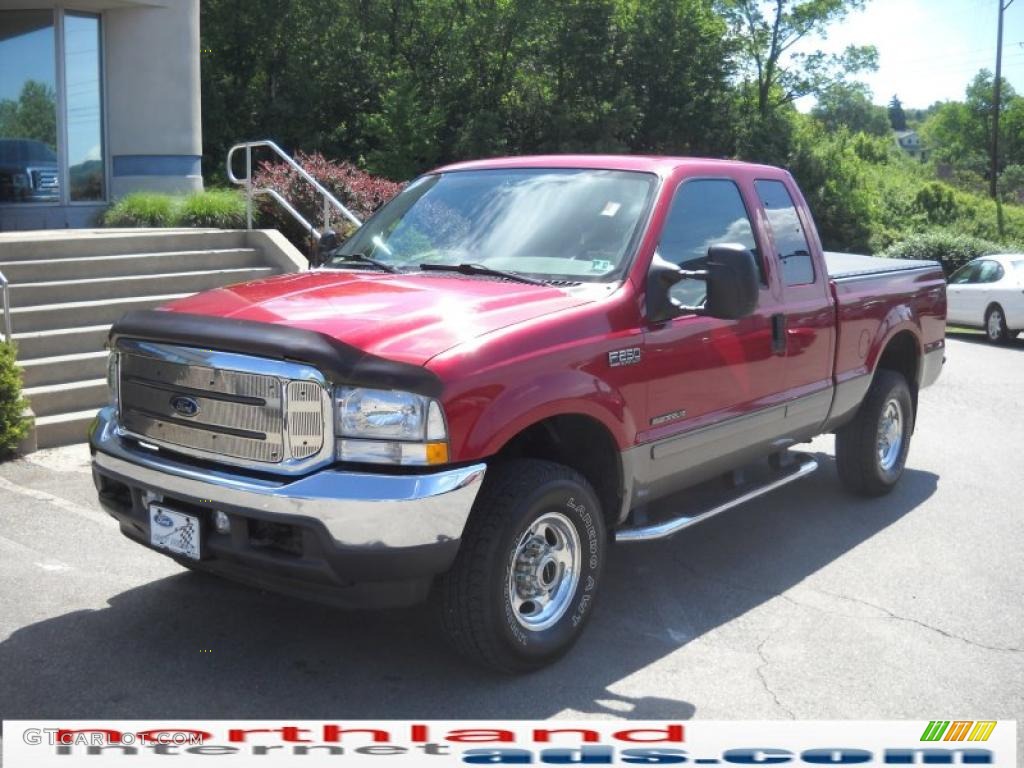 2002 F250 Super Duty Lariat SuperCab 4x4 - Toreador Red Metallic / Medium Parchment photo #2