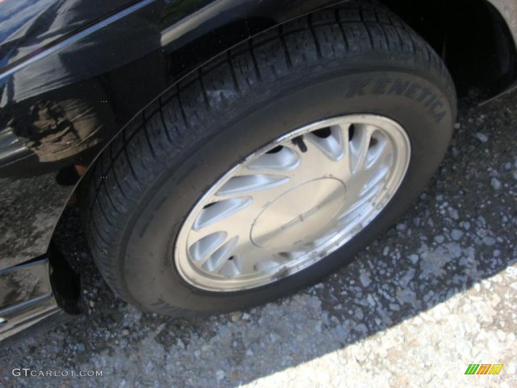 1997 Continental  - Black Clearcoat / Light Parchment photo #6