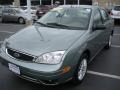 2005 Light Tundra Metallic Ford Focus ZX4 SE Sedan  photo #1