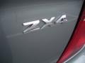 2005 Light Tundra Metallic Ford Focus ZX4 SE Sedan  photo #7