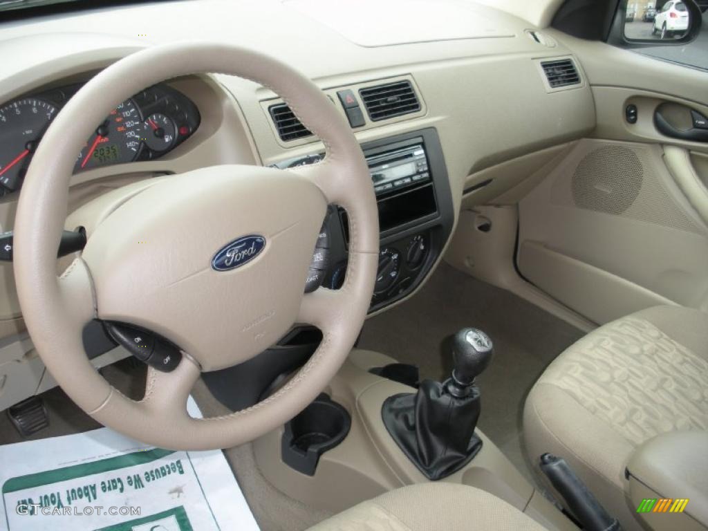 2005 Focus ZX4 SE Sedan - Light Tundra Metallic / Dark Pebble/Light Pebble photo #12