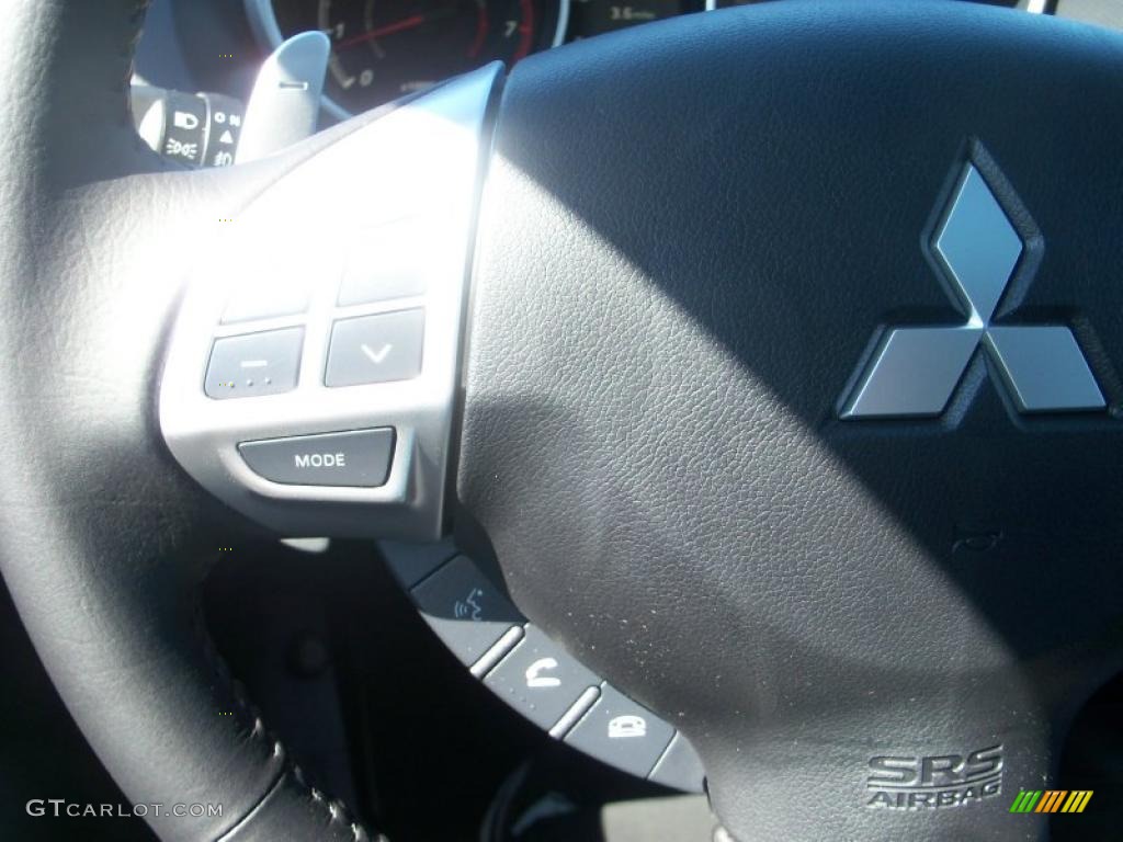 2010 Outlander SE 4WD - Cosmic Blue Metallic / Black photo #9