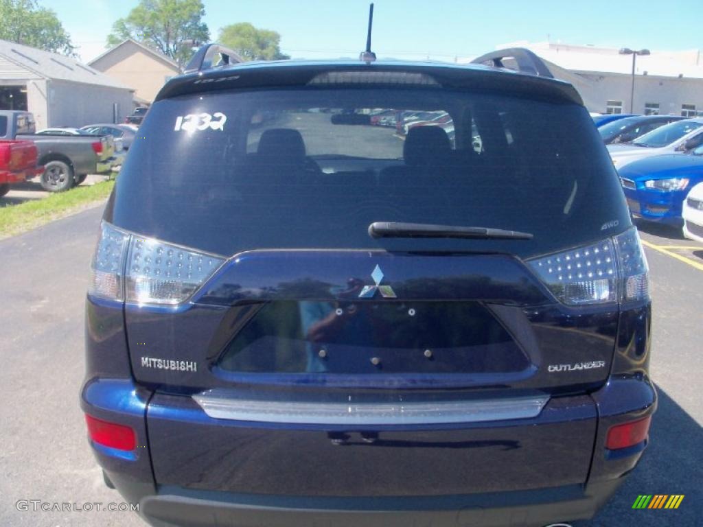 2010 Outlander SE 4WD - Cosmic Blue Metallic / Black photo #12