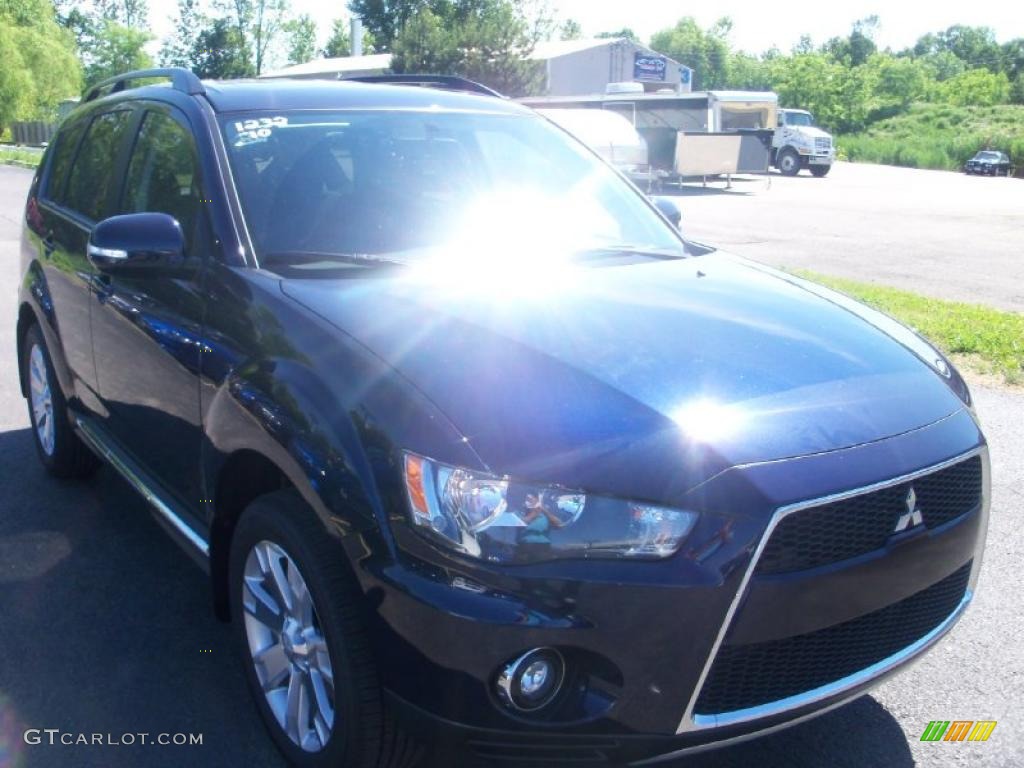 2010 Outlander SE 4WD - Cosmic Blue Metallic / Black photo #14