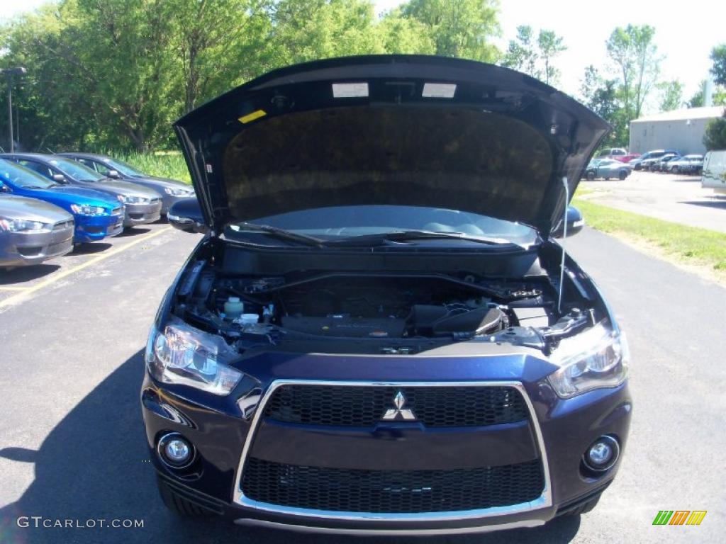 2010 Outlander SE 4WD - Cosmic Blue Metallic / Black photo #16