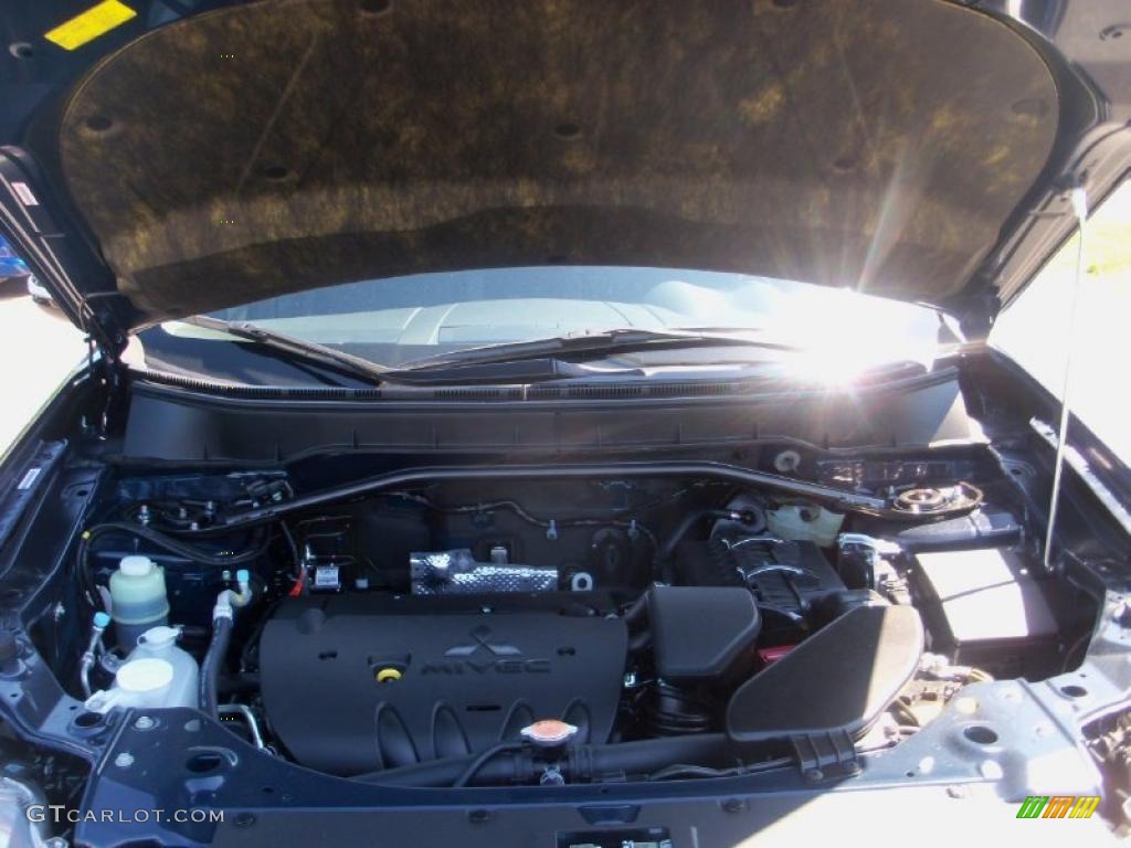 2010 Outlander SE 4WD - Cosmic Blue Metallic / Black photo #17