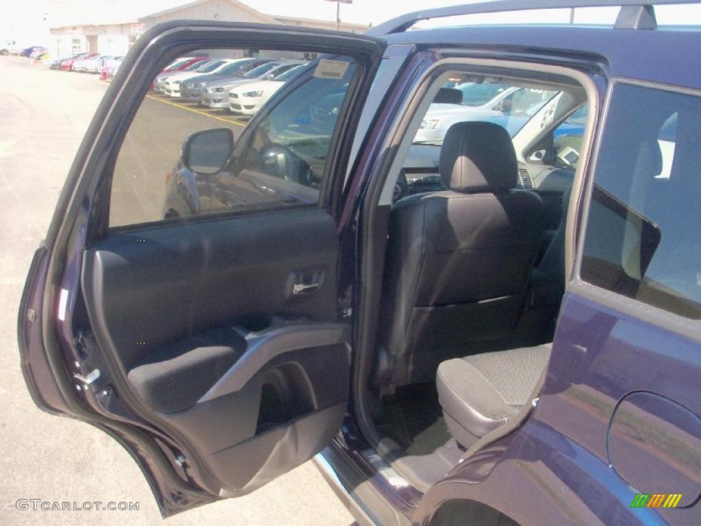 2010 Outlander SE 4WD - Cosmic Blue Metallic / Black photo #19