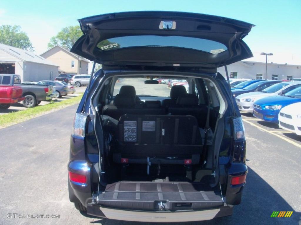 2010 Outlander SE 4WD - Cosmic Blue Metallic / Black photo #20