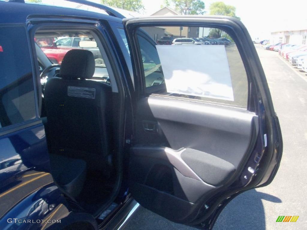2010 Outlander SE 4WD - Cosmic Blue Metallic / Black photo #23