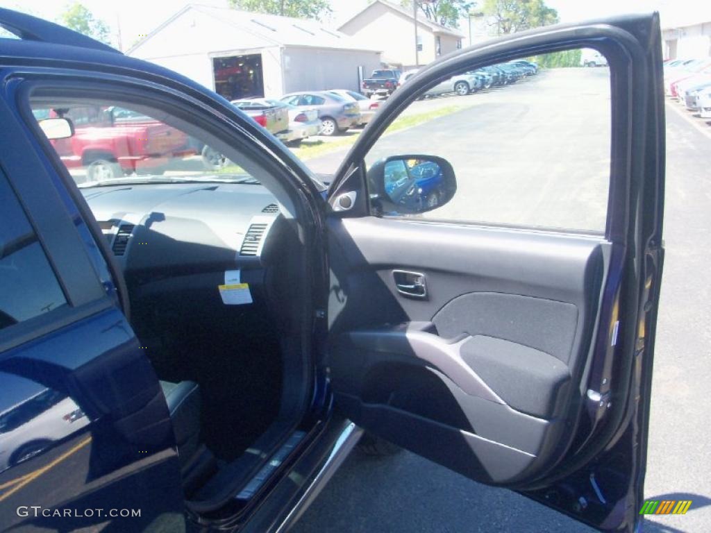 2010 Outlander SE 4WD - Cosmic Blue Metallic / Black photo #25