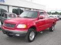 2000 Bright Red Ford F150 XLT Extended Cab 4x4  photo #1