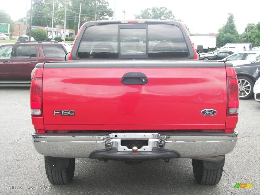 2000 F150 XLT Extended Cab 4x4 - Bright Red / Dark Graphite photo #22