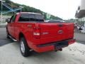 2005 Bright Red Ford F150 STX SuperCab 4x4  photo #2