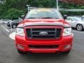 2005 Bright Red Ford F150 STX SuperCab 4x4  photo #7