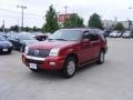 2006 Vivid Red Metallic Mercury Mountaineer Luxury AWD  photo #4