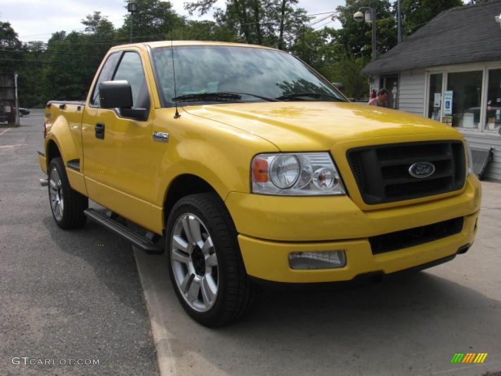 2004 F150 STX Regular Cab - Blazing Yellow / Dark Flint photo #2