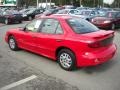 2002 Bright Red Pontiac Sunfire SE Sedan  photo #5