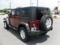 2010 Red Rock Crystal Pearl Jeep Wrangler Unlimited Sport 4x4  photo #2