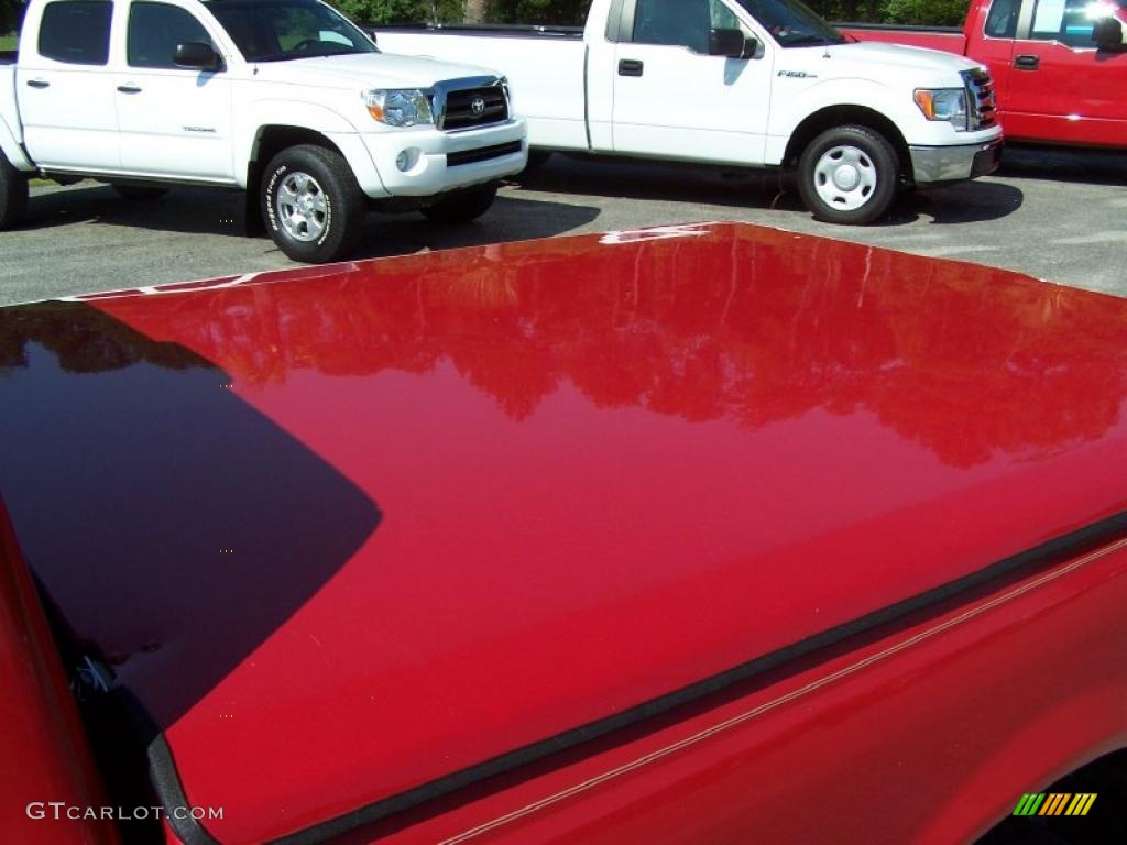2000 Ranger XLT SuperCab - Bright Red / Medium Prairie Tan photo #10