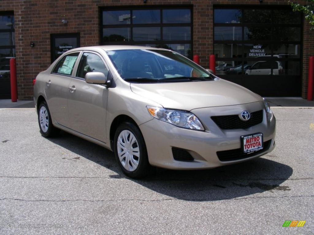 Desert Sand Metallic Toyota Corolla