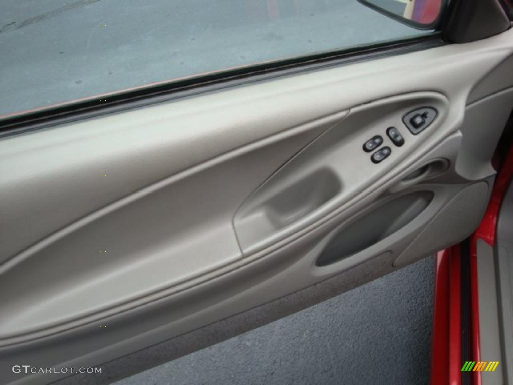 1999 Mustang V6 Coupe - Laser Red Metallic / Light Graphite photo #11