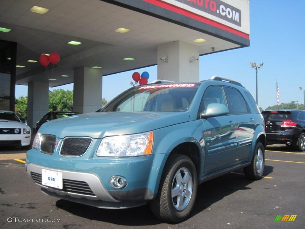 Teal Metallic Pontiac Torrent