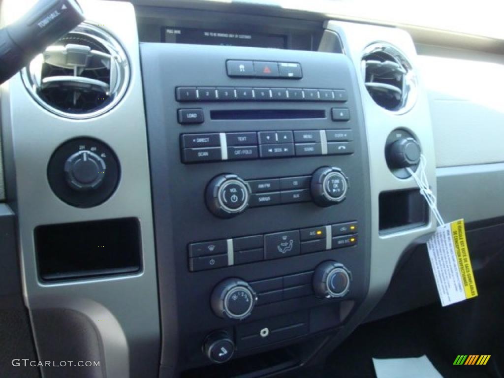 2010 F150 XLT SuperCab 4x4 - Dark Blue Pearl Metallic / Medium Stone photo #9