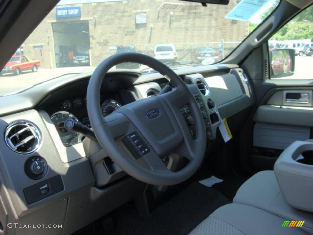 2010 F150 XLT SuperCab 4x4 - Dark Blue Pearl Metallic / Medium Stone photo #15
