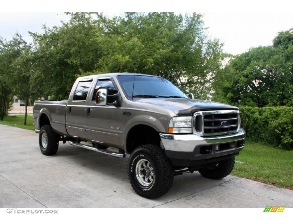 2003 F350 Super Duty Lariat Crew Cab 4x4 - Arizona Beige Metallic / Medium Parchment photo #14