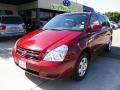 2006 Claret Red Kia Sedona LX  photo #1