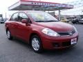 2009 Red Brick Nissan Versa 1.8 S Sedan  photo #7