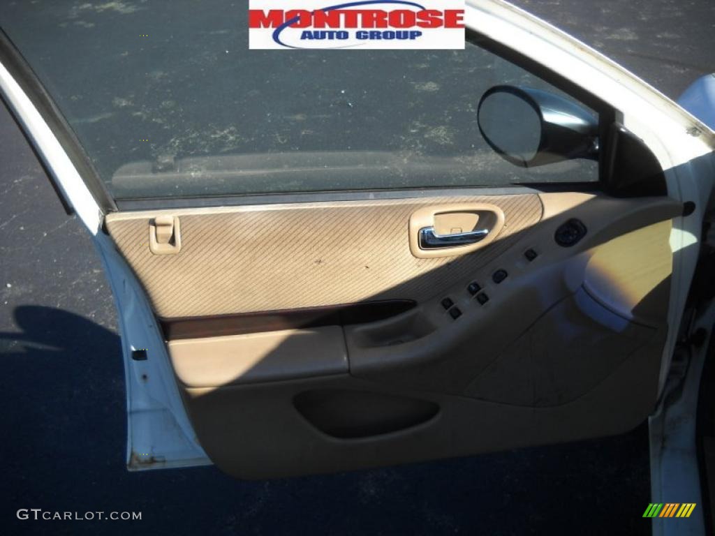 1997 Cirrus LX - Stone White / Beige photo #8