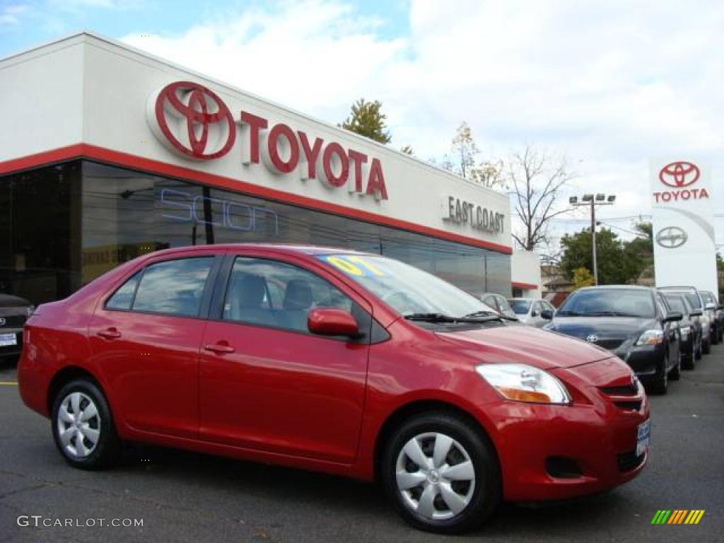 2007 Yaris Sedan - Barcelona Red Metallic / Bisque photo #1