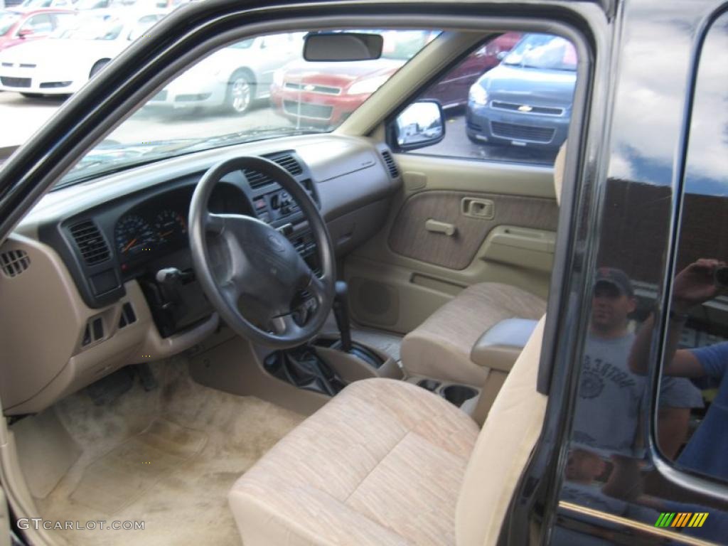 1999 Frontier SE Extended Cab 4x4 - Super Black / Beige photo #7