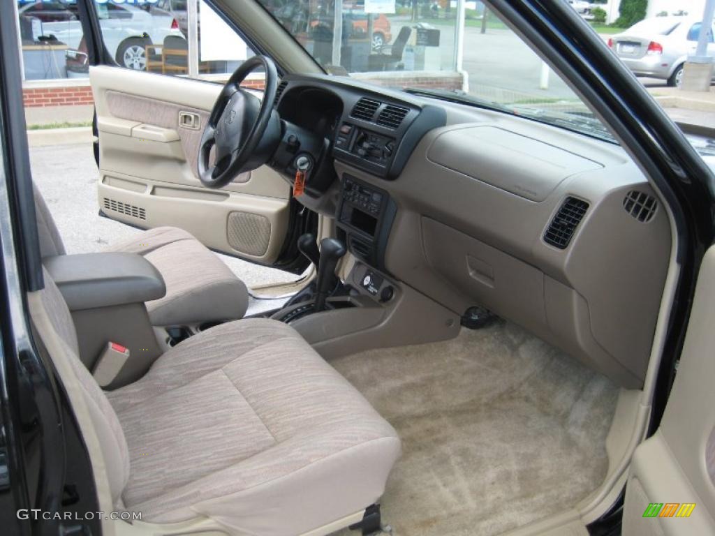 1999 Frontier SE Extended Cab 4x4 - Super Black / Beige photo #9
