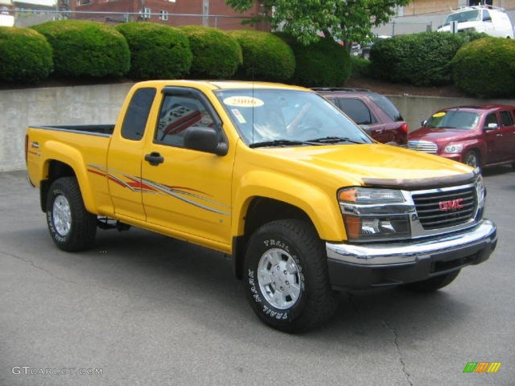 2006 Canyon SLE Extended Cab 4x4 - Flame Yellow / Dark Pewter photo #1