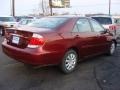 2006 Salsa Red Pearl Toyota Camry LE  photo #3