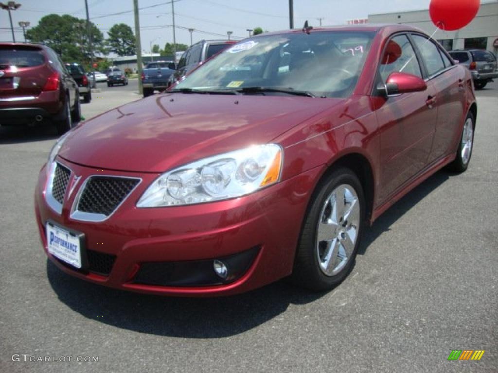 2010 G6 GT Sedan - Performance Red Metallic / Ebony photo #1