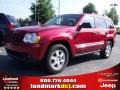 2010 Inferno Red Crystal Pearl Jeep Grand Cherokee Laredo 4x4  photo #1