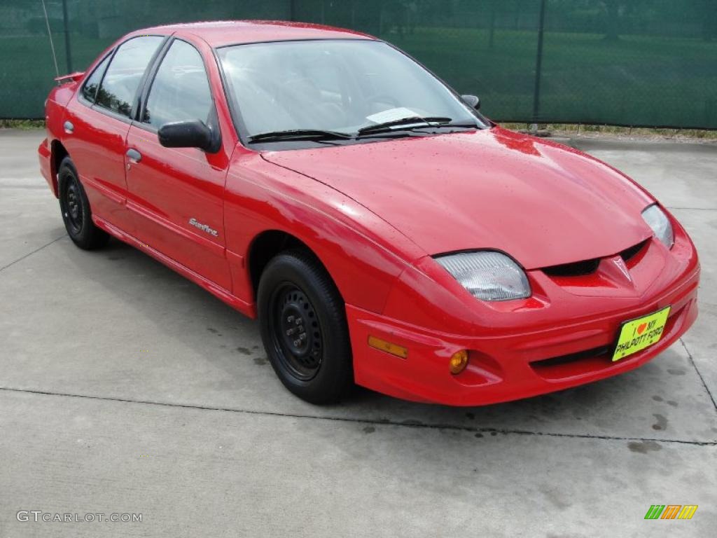 Bright Red Pontiac Sunfire. 