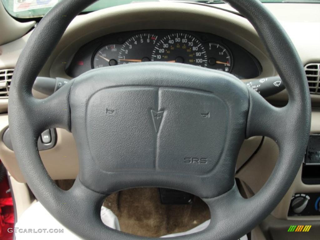 2001 Sunfire SE Sedan - Bright Red / Taupe photo #33
