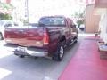 2005 Dark Toreador Red Metallic Ford F250 Super Duty Lariat Crew Cab 4x4  photo #8