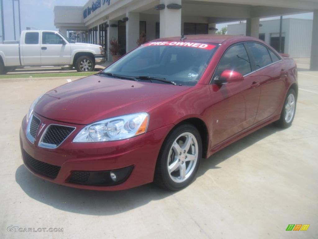 2009 G6 GT Sedan - Performance Red Metallic / Ebony photo #1