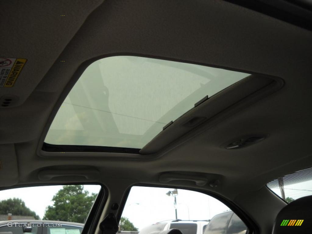 2000 Cirrus LXi - Bright Silver Metallic / Agate Black photo #22